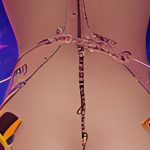 a colorful and abstract representation of various adult toys and accessories, such as vibrators, handcuffs, lingerie, and more. The shapes and colors blend together seamlessly to create a visually striking image that captures the essence of the adult industry.